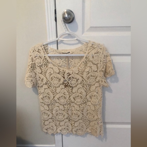 Beautiful cream top. Bought in the U.K. - Picture 1 of 3